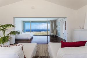 Postel nebo postele na pokoji v ubytování Adult Only Casa Chana - Contemporary villa with Private Pool and Sea Views