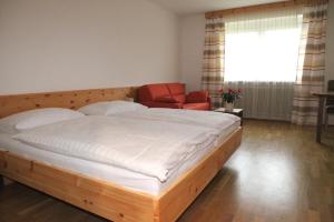 Postel nebo postele na pokoji v ubytování Kirchenwirt in Kematen an der Krems