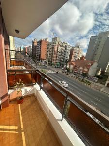 a balcony with a view of a city street at Marcelinos la perla in Mar del Plata