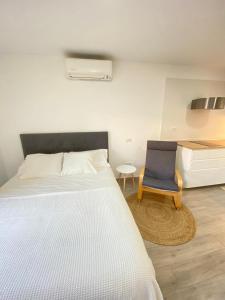 Postel nebo postele na pokoji v ubytování Estudio en los Cristianos. Ubicación ideal.