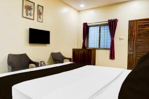 TV/trung tâm giải trí tại Hotel O Saideep Lodging