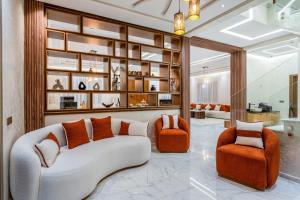 a living room with a couch and two chairs at Villa Lina in Marrakech