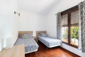 Ένα ή περισσότερα κρεβάτια σε δωμάτιο στο Villa Jardines de Cope +22 φωτογραφίες