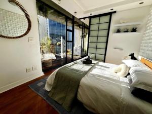 Postel nebo postele na pokoji v ubytování Chic 1 Bedroom City Centre Apartment