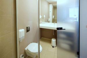 Koupelna v ubytování Adresa Suites