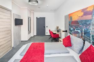 TV a/nebo společenská místnost v ubytování Rimedya Hotel - an der Messe München