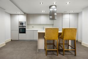 Kuchyň nebo kuchyňský kout v ubytování INMálaga Luxury Loft 3