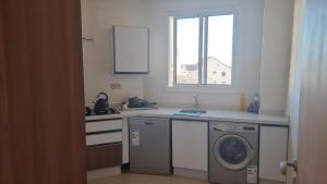 Η κουζίνα ή μικρή κουζίνα στο Appartement luxueux