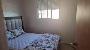 Ένα ή περισσότερα κρεβάτια σε δωμάτιο στο Appartement luxueux