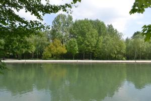 a large body of water with trees in the background at Munich Oktoberfest Basic Camping in Munich