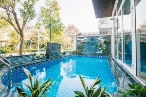 Πισίνα στο ή κοντά στο Villa FLC Sầm Sơn Ngọc Trai Nt11 7 Phòng +14 φωτογραφίες