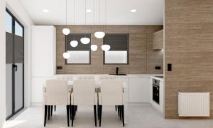 a kitchen with a dining table and white chairs at SUNNYHOME Chalet, Neunburg vorm Wald in Neunburg vorm Wald