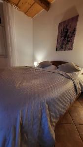 En eller flere senge i et værelse på Apartament Silence Dzień Dobry Śnieżko