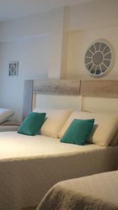 Postel nebo postele na pokoji v ubytování Hotel Plaza Formosa