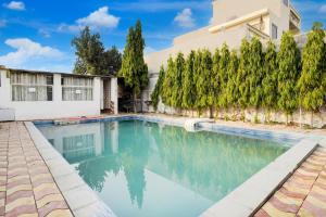 Fotografie z fotogalerie ubytování Hotel O R B Farms v destinaci Ghaziabád