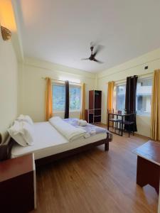 JAP Guest House & Apartments客房内的一张或多张床位