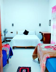 Una cama o camas en una habitación de Ella Hushwood