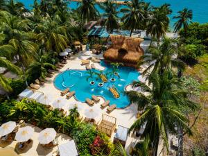 an overhead view of a pool at a resort at Palmarito Beach Hotel in Tierra Bomba