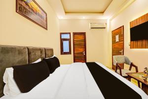 Gallery image of Hotel O Charmwood Inn in Faridabad +22 photos