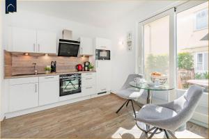 Η κουζίνα ή μικρή κουζίνα στο Ferienhaus Kuschelnest