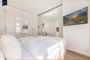 Ένα ή περισσότερα κρεβάτια σε δωμάτιο στο Ferienhaus Kuschelnest