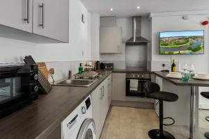 Nhà bếp/bếp nhỏ tại City Heights Studio - Short Stays UK