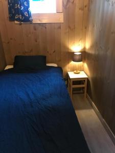 En eller flere senge i et værelse på Villa Fjara sleeps 34