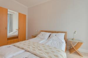 Łóżko lub łóżka w pokoju w obiekcie Imperial Apartments - Galeria