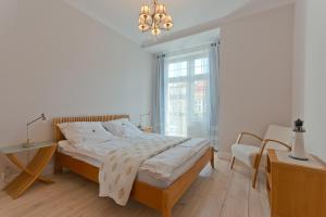 Łóżko lub łóżka w pokoju w obiekcie Imperial Apartments - Galeria