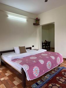 JAP Guest House & Apartments客房内的一张或多张床位