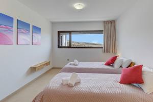 En eller flere senge i et værelse på Casa Bea Villaverde + 38 billeder