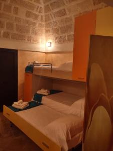 Ένα ή περισσότερα κρεβάτια σε δωμάτιο στο Casa Alisea