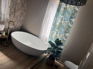 Koupelna v ubytování Residenza FedericoII + 3 fotografie