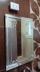 a glass shower in a bathroom with a sink at Fully Brand New Furnished Apartment in Sheikh Zayed +21 photos