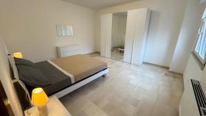 Postel nebo postele na pokoji v ubytování Dimora Tra Mare e Montagna