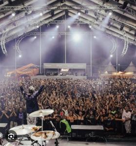 a large crowd of people in a concert at Leo in Punta del Este