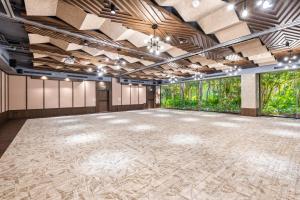 a large room with a large dance floor at Aloft Tulum in Tulum