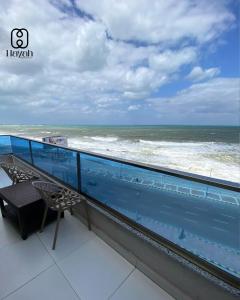 a balcony with a view of the ocean at Hayah Waterfalls Hotels in Alexandria