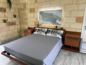 Ένα ή περισσότερα κρεβάτια σε δωμάτιο στο Largo Spani 15
