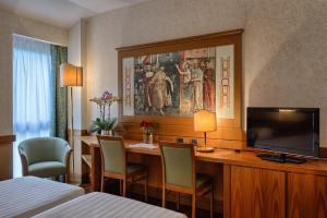 TV a/nebo společenská místnost v ubytování BV Grand Hotel Assisi