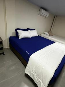 Katil atau katil-katil dalam bilik di Hollywood Lofts alojamiento
