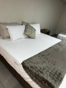 Katil atau katil-katil dalam bilik di Hollywood Lofts alojamiento