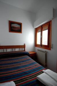Postel nebo postele na pokoji v ubytování Apartamentos Turísticos Rural Los Tinaos