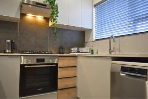 Imagen de la galería de Luxury 2 bed York Retreat - Townhouse 3 - 1 on york, en George 25 fotos más