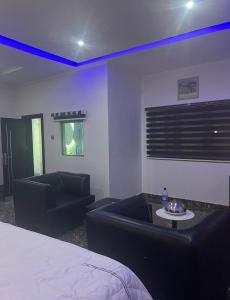 Voodi või voodid majutusasutuse Basil Hotel and Suites toas