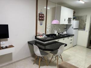 Köök või kööginurk majutusasutuses Bella Peroba Flats #Lua de Mel Hidromassagem - Maragogi AL