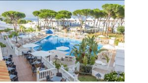 a view of the pool at a resort at Casa Latifa in Marbella