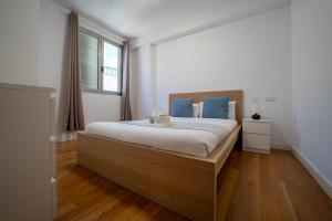 Katil atau katil-katil dalam bilik di Sabbia Suites Amonak