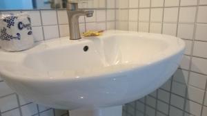 A bathroom at Prominent Hotel and Suites