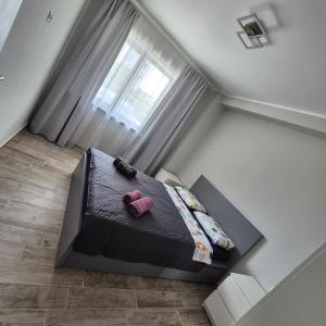 an overhead view of a bed in a room at Studio Palaz in Constanţa +3 photos